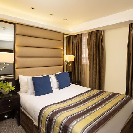 Park Grand Mayfair Londres Exterior foto A bedroom at the hotel